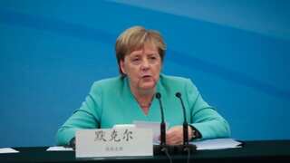 Merkel's conservatives, SPD avert crisis with German pension deal