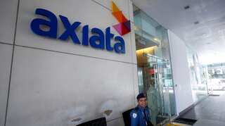 Malaysia's Axiata flags other deals, tower unit IPO after Telenor letdown