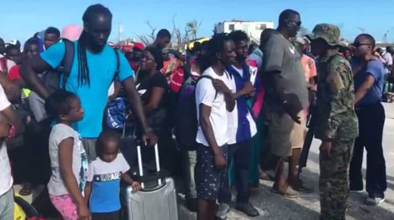 Amid fears of far higher Dorian death toll, islanders scramble to leave
