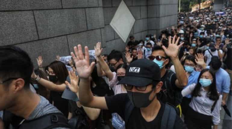 Hong Kong leader tells US not to 'interfere' after fresh protests