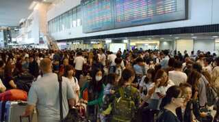 Nearly 17,000 passengers stranded at Tokyo's Narita airport as Typhoon Faxai hits