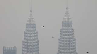 Malaysia sends half a million face masks to haze-hit state as fires burn