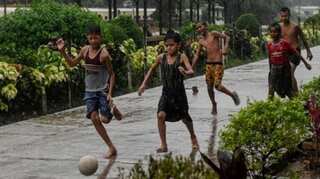 Dung and Dragons: Myanmar kids dodge cows to play rugby