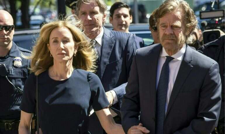 Felicity Huffman sentenced to 14 days in prison for college admissions scam Felicity Huffman sentenced to 14 days in prison for college admissions scam