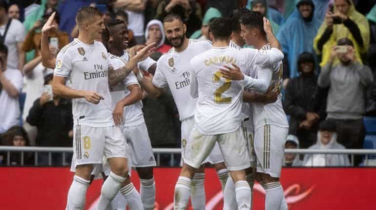 Real Madrid hang on for win after Benzema brilliance