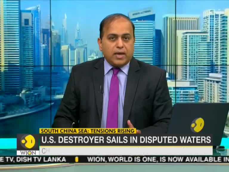 US destroyer sails in disputed South China Sea amid trade talks