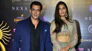 Who was the mystery girl accompanying Salman Khan on the red carpet at IIFA 2019?