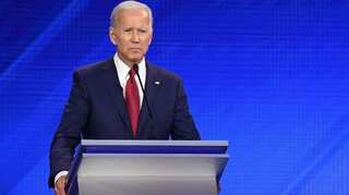 Ex-US Vice President Biden denies inappropriate conduct over alleged kiss