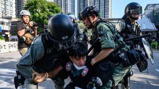Hong Kong police, protesters clash in 16th weekend of rallies