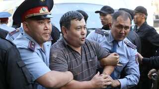 Dozens detained as Kazakhs protest against former president, China