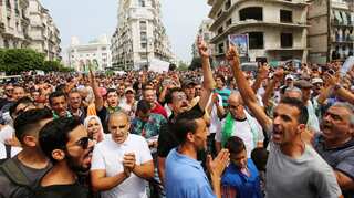 Thousands protest in Algiers despite tight security