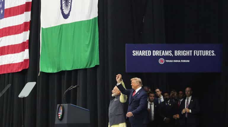 Hand-in-hand, Modi-Trump take stage at 'Howdy, Modi!' Hand-in-hand, Modi-Trump take stage at 'Howdy, Modi!'