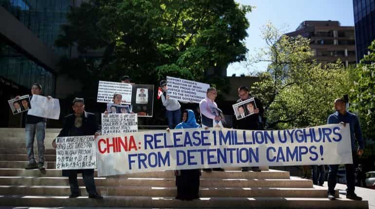 China's crackdown in Xinjiang: For Uighur refugees, freedom means losing family