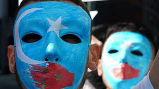 China says people held in Xinjiang camps have 'graduated', condemns US bill
