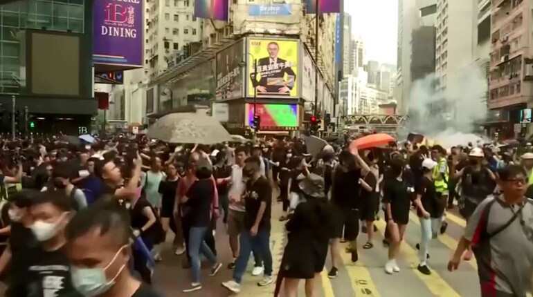 Thousands in Hong Kong defy China's Xi with pro-democracy rallies