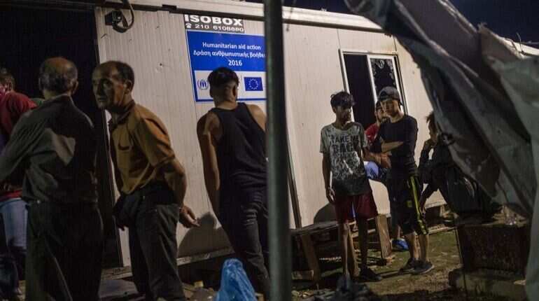 Riots at Greek migrant camp after two die in a fire Riots at Greek migrant camp after two die in a fire