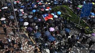 Hong Kong defies China anniversary with 'Day of Grief' rallies and clashes