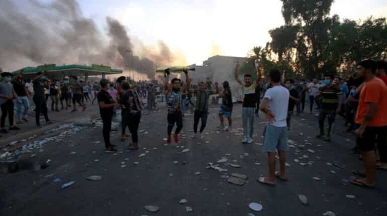 Thousands in bloody protests across Iraq, 31 dead
