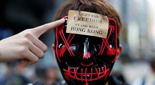 Amnesty urges Hong Kong to probe bloody attack on pro-democracy leader