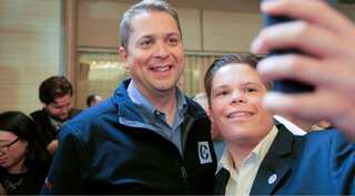 Canada opposition chief pressed on US citizenship, drops candidate for anti-gay comments