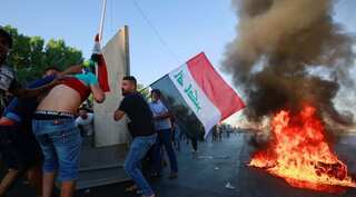 United Nations says 'this must stop' after Iraqi protest violence kills nearly 100