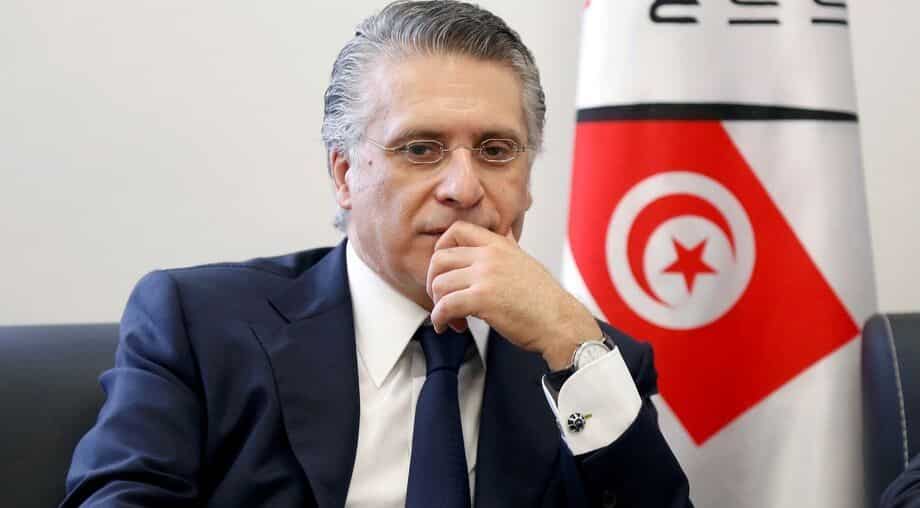 Outsiders battle political elite as Tunisia votes
