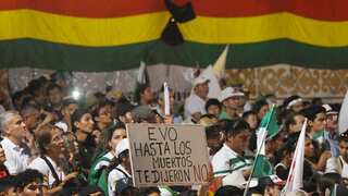 Bolivian farmers protest against interim president at site of killings