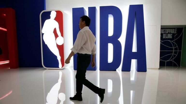 Chinese organisers cancel NBA fan event amid free speech row