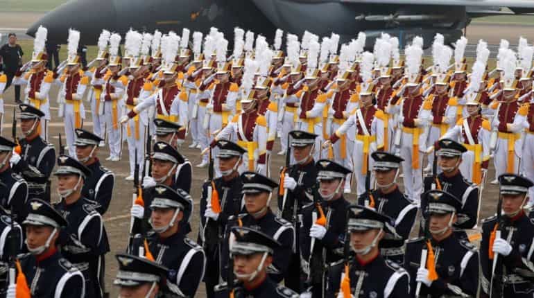 South Korea's army says will cut force by 100,000 in three years South Korea's army says will cut force by 100,000 in three years