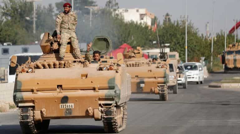 800 relatives of IS members flee Syria camp as Turkey battles Kurds 800 relatives of IS members flee Syria camp as Turkey battles Kurds