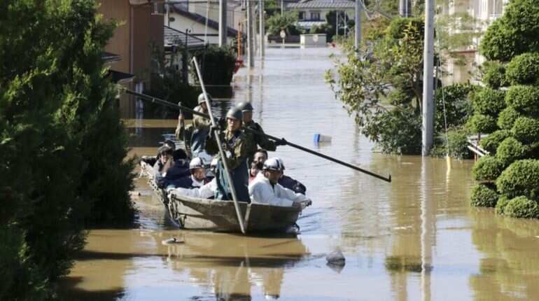 Shinzo Abe visits typhoon-hit areas; Japan may postpone new Emperor's parade