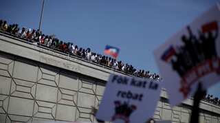 Haitians flock to streets in anti-government protest