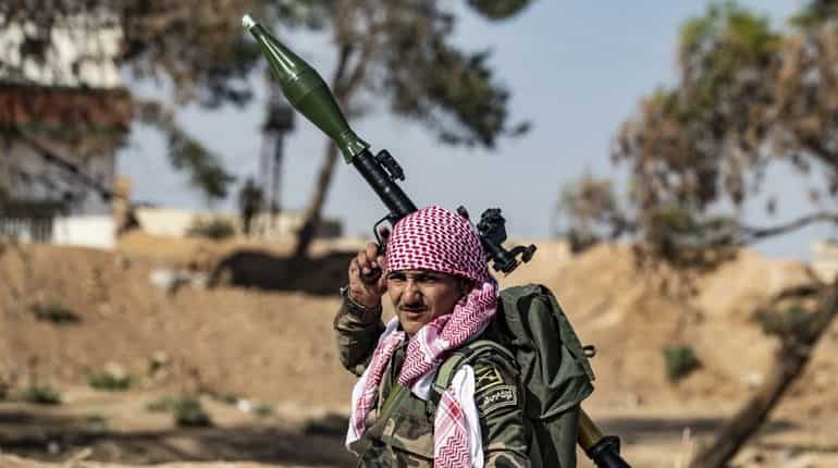 Russian forces patrolling between Syrian, Turkish groups