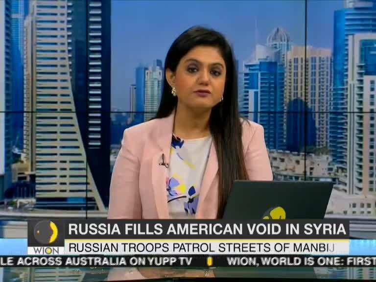 Russian troops patrol Syrian towns
