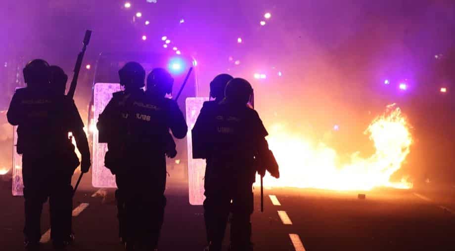 Violence 'must stop now', says Catalan President as Barcelona burns