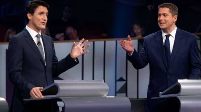 Liberals, Tories slug it out on last day of Canada election Liberals, Tories slug it out on last day of Canada election