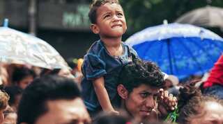 Migrants enter slowly at Guatemala-Mexico border after scuffles