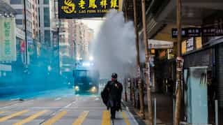 Hong Kong leader visits mosque struck by blue water-cannon dye