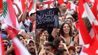 Tens of thousands demonstrate again as Lebanon's government frays