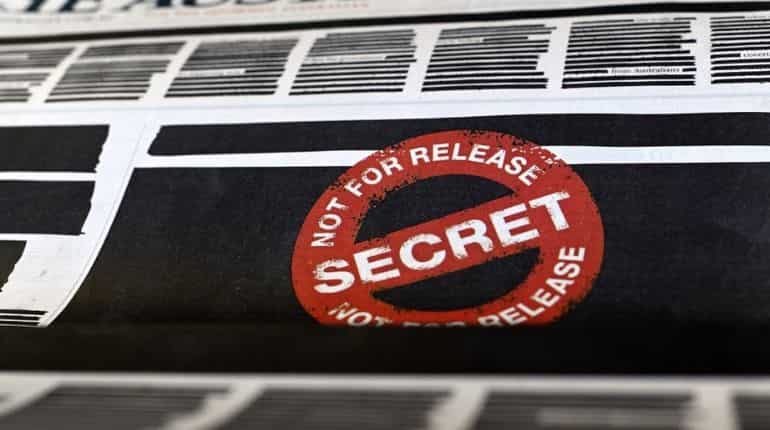 Australian newspapers blackout front pages to fight back against crackdown on press freedom