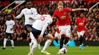 Liverpool winning streak ends with draw at Manchester United