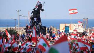 Facing protests, Lebanon approves emergency economic reforms