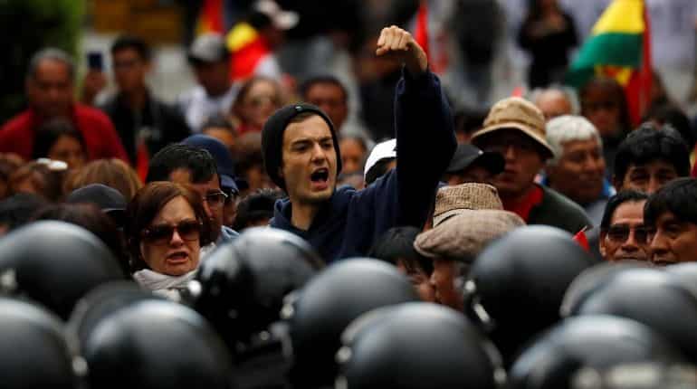 Police in Bolivia join opposition as crisis mounts Police in Bolivia join opposition as crisis mounts