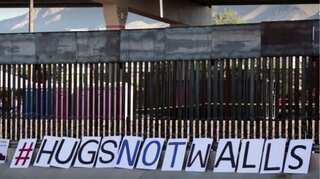 Families reunited in 'Hugs Not Walls' event at United States-Mexico border
