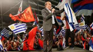 Uruguay faces second round election with candidates in close battle