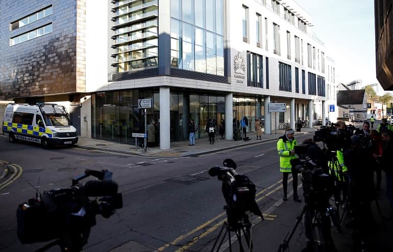 Driver of truck found with 39 bodies appears in British court