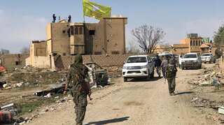 Turkey says Kurdish YPG has not fully withdrawn from Syria border region