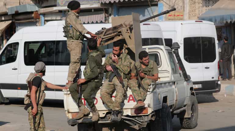 Turkey says Kurdish YPG still in Syria border area as deadline looms