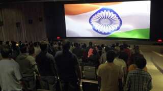 Kannada actors Arun Gowda and BV Aishwarya heckle family at a movie theatre for sitting during national anthem