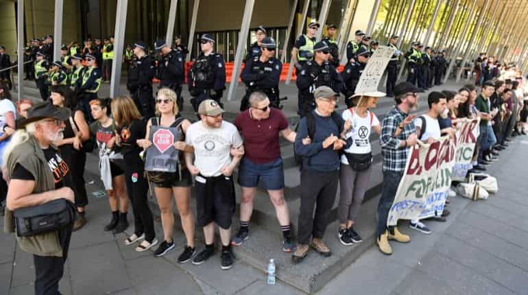 Dozens arrested as Australia mining protest turns violent Dozens arrested as Australia mining protest turns violent